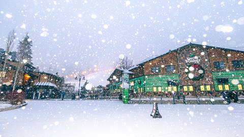 Fresh snow fall falling at Snow Summit's base area