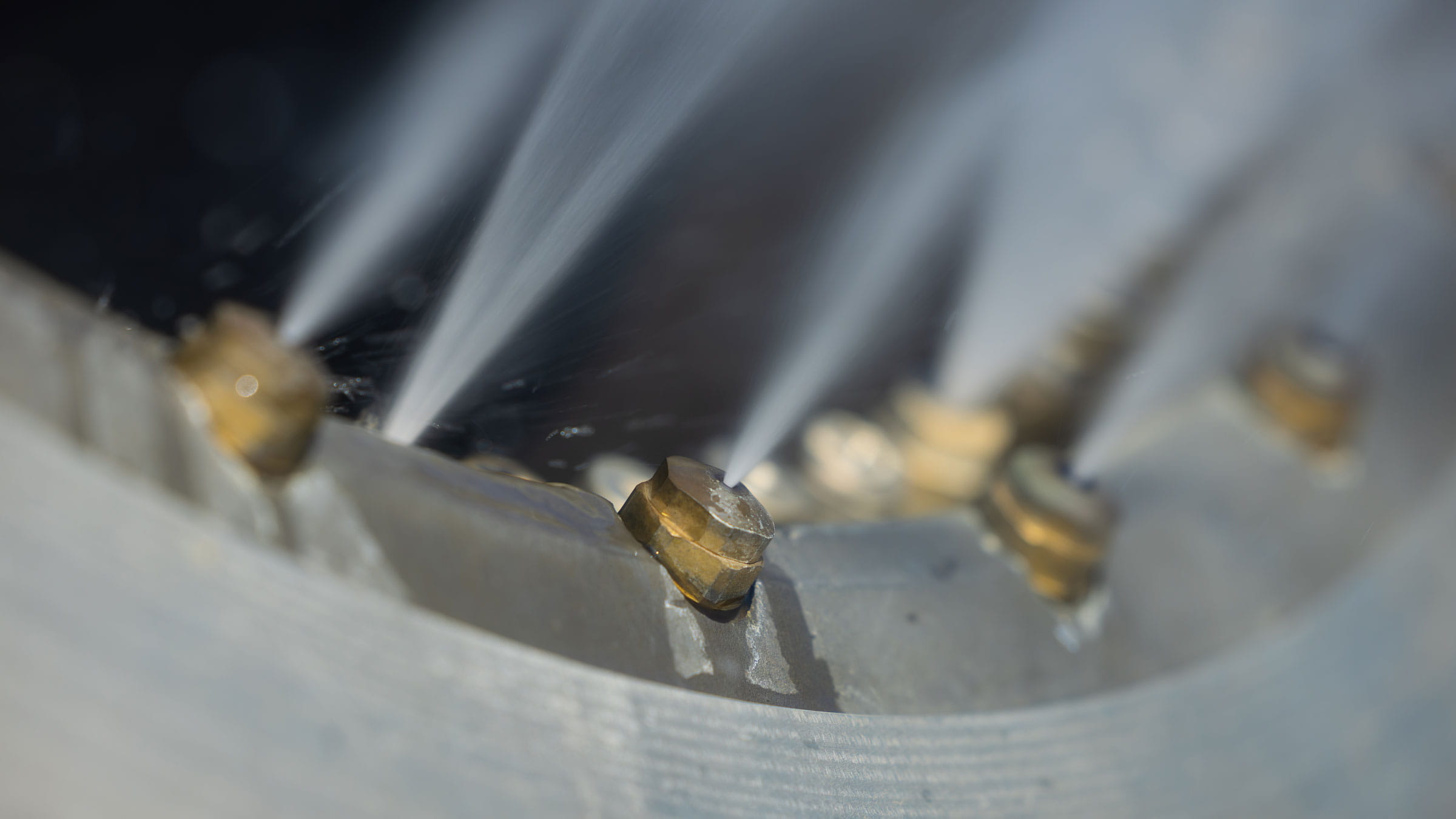 Nozzles on a snow fun blowing out water which will turn into man made snow.