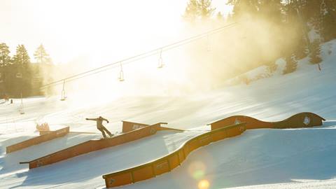 Snowboarder on rail
