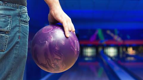 Person holding a bowling ball
