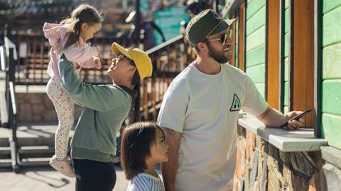 Family of four at the Summit Bike Park ticket window