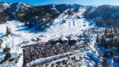 Drone view of parking lot at bear mountain in the winter