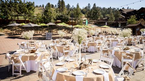 Outdoor wedding reception in the summer at Snow Summit in the base area